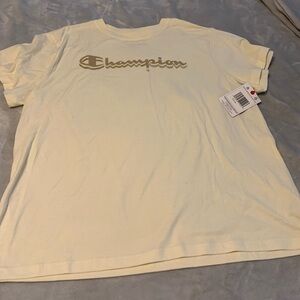 Champion Woman’s Cream T-Shirt w/gold